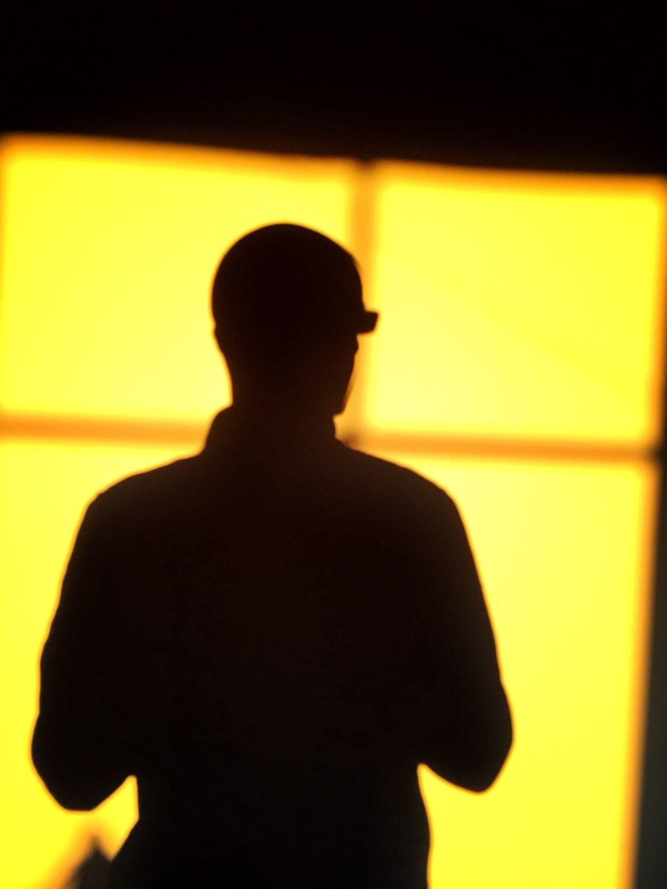 silhouette, indoors, lifestyles, standing, shadow, leisure activity, men, sunset, three quarter length, outline, waist up, dark, rear view, yellow, illuminated, person, orange color, side view