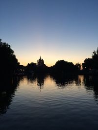 Silhouette of buildings at sunset