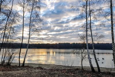 Scenic view of lake against sky during sunset