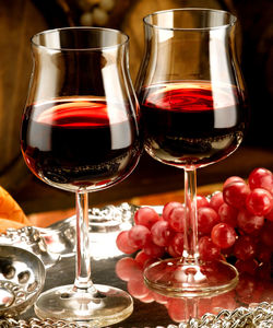 Close-up of wine glasses on table