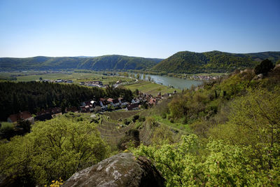 Landscape with mountain range in background