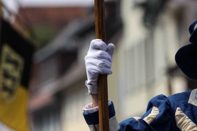 Close-up of hand holding statue