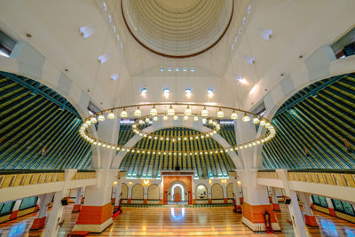 Low angle view of illuminated ceiling