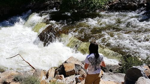 Woman standing in water