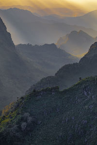 Scenic view of mountains against sky during sunset