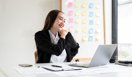 Businesswoman working at office