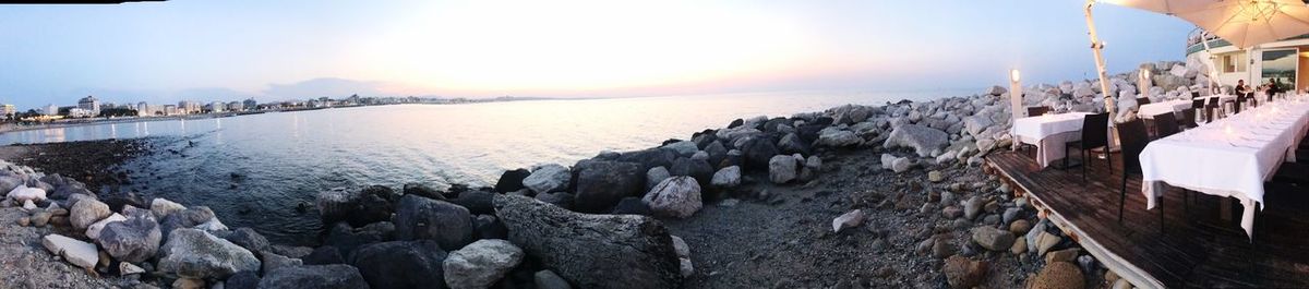 Panoramic view of sea against sky during sunset