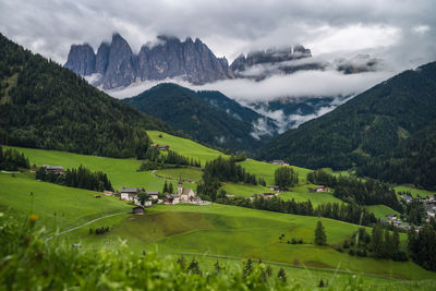 Scenic view of landscape and mountains against sky