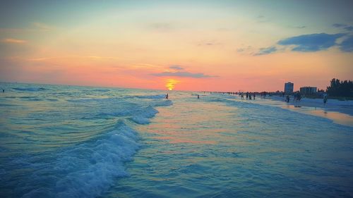 Scenic view of sea at sunset