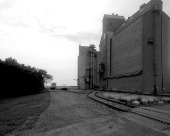 View of road along buildings