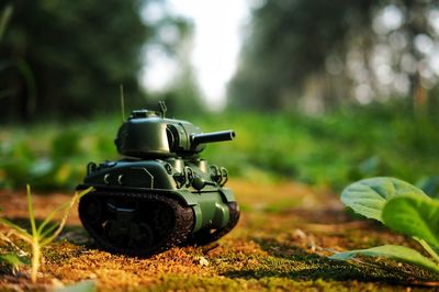 Close-up of vintage toy car on field