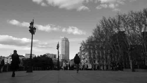 City street against cloudy sky