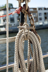 Close-up of rope tied to bollard