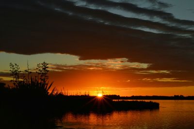 Scenic view of sunset over sea