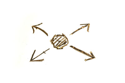 Close-up of clock over white background