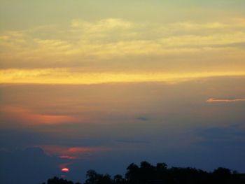 Scenic view of dramatic sky during sunset