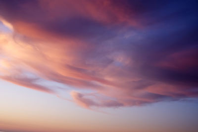 Low angle view of dramatic sky during sunset