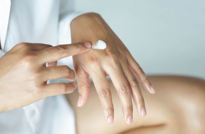 Close-up of woman hand with tattoo