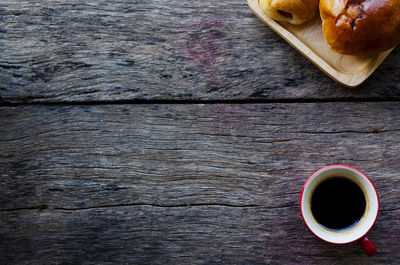 High angle view of coffee cup on table