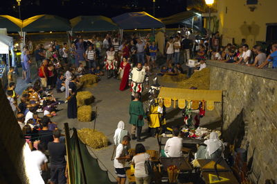 People on street market in city