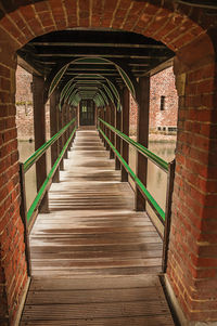 Wooden drawbridge and walkway at de haar castle, near utrecht. a gothic style castle in netherland.