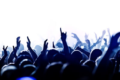 Crowd enjoying at music concert at night