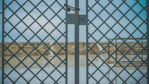 Chainlink fence against sky