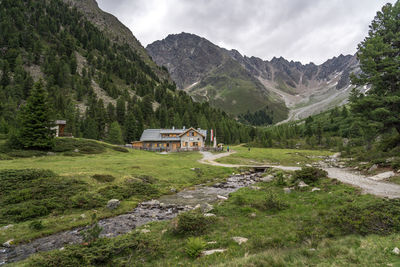 Scenic view of landscape and mountains against sky