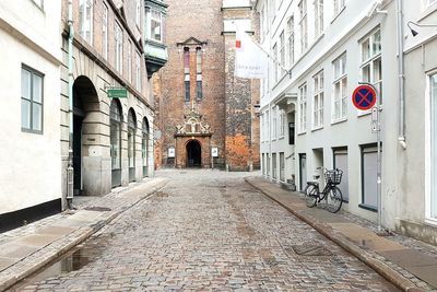 Narrow alley along buildings