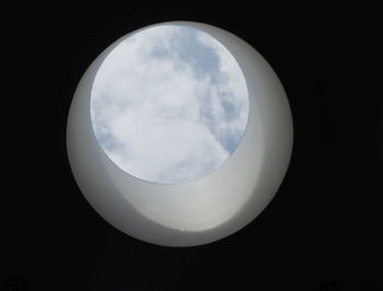 Low angle view of moon against sky at night