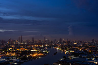 Cityscape of bangkok at sunrise with view chao phraya river from above