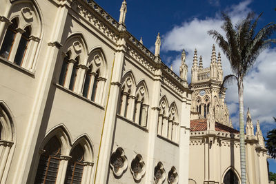 Low angle view of statue against sky