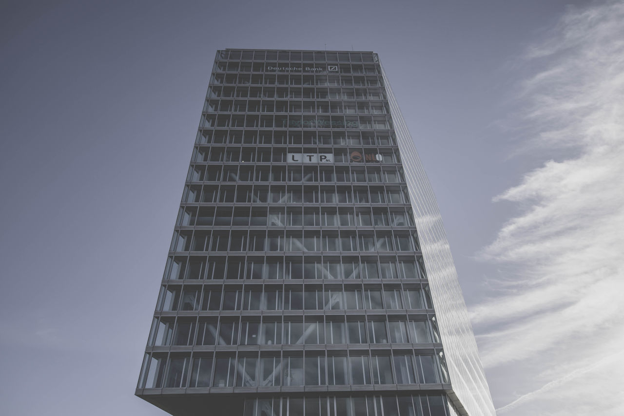 LOW ANGLE VIEW OF MODERN BUILDINGS AGAINST SKY