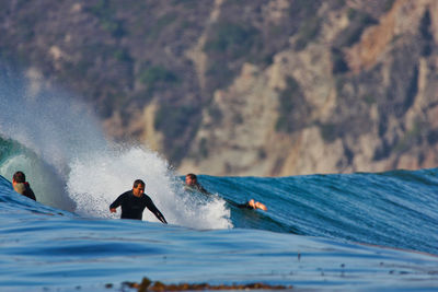 People enjoying in sea