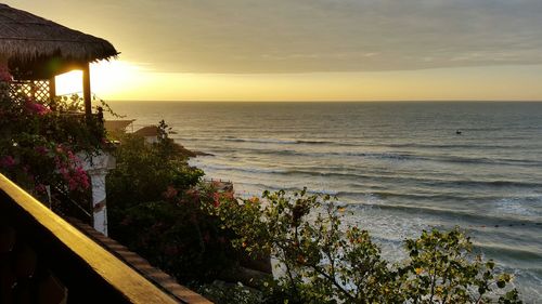 Scenic view of sea against sky at sunset