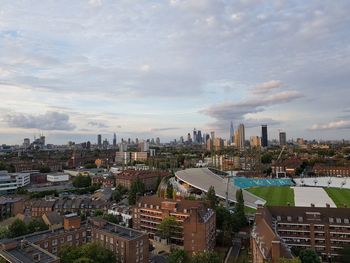 High angle view of buildings in city against sky