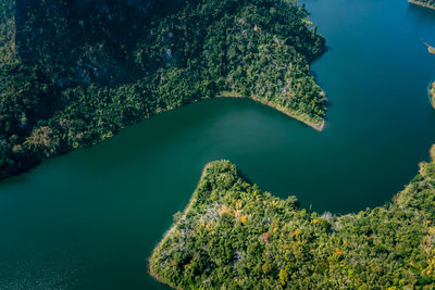 National reservoir or dam curved in the middle of the valley at chiang rai thailand landscape 