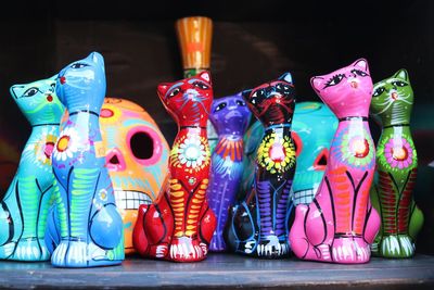 Close-up of multi colored figurines on table