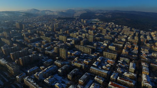 Aerial view of cityscape against sky