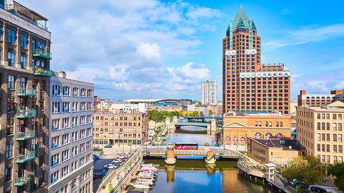 Buildings in city against sky