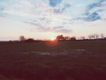 Scenic view of landscape at sunset