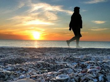 Scenic view of sea at sunset