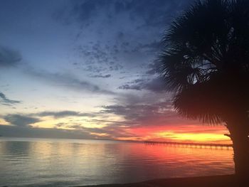 Scenic view of sea against sky at sunset