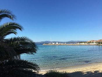 Scenic view of sea against blue sky