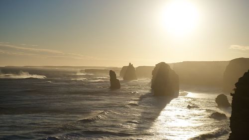 Panoramic view of sea against sky during sunset