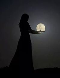 Silhouette of woman at night