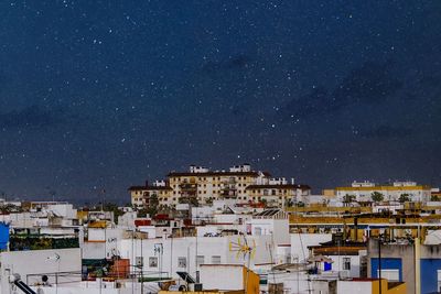 High angle view of townscape against sky at night