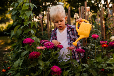 Full length of cute baby flowering plants