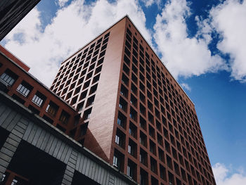 Low angle view of modern building against sky