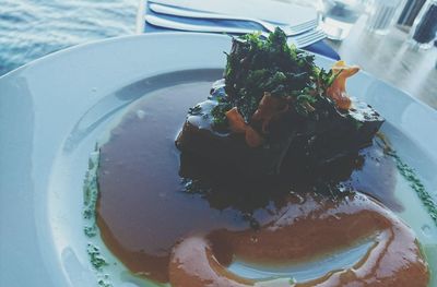 Close-up of food in plate on table